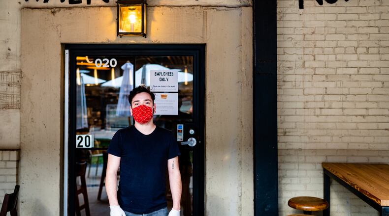Christian Martinez, an employee of Forza Storico, otuside of the restaurant. He recently tested negative for COVID-19. CONTRIBUTED BY HENRI HOLLIS