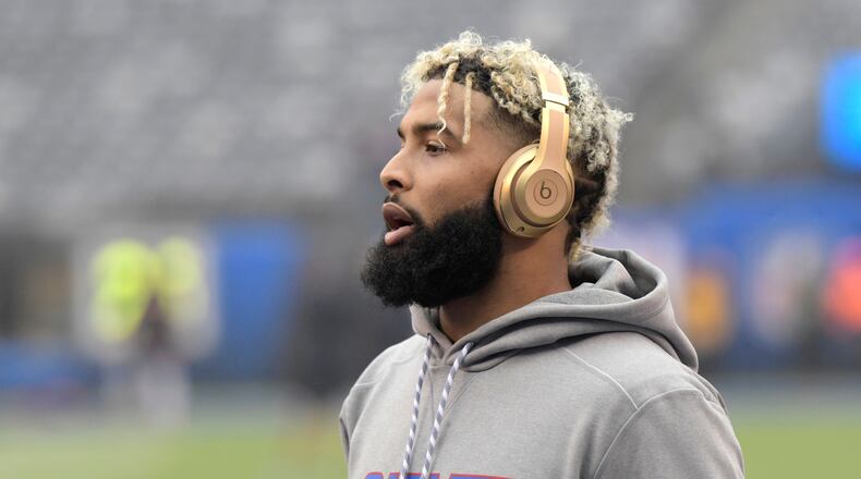 FILE - New York Giants wide receiver Odell Beckham warms up prior to an NFL football game against the Chicago Bears, Dec. 2, 2018, in East Rutherford, N.J. (AP Photo/Bill Kostroun, file)