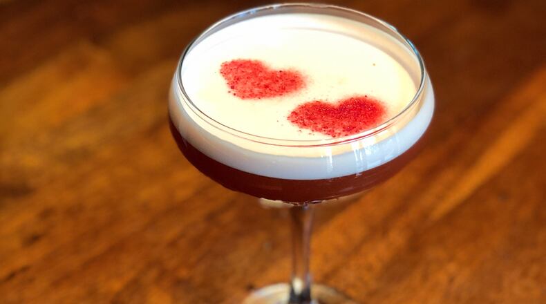 Two Trio at the Four Seasons bartenders created the Two Hearts cocktail, which will be featured at a music-themed dinner at the restaurant with songs like U2's "Two Hearts Beat as One" playing.