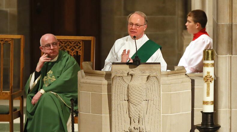 090813 Atlanta: - Deacon Gerald Zukauckas speaks to the congregation on the nation's immigration system during church services at Cathedral of Christ the King on Sunday, Sept. 8, 2013, in Atlanta.