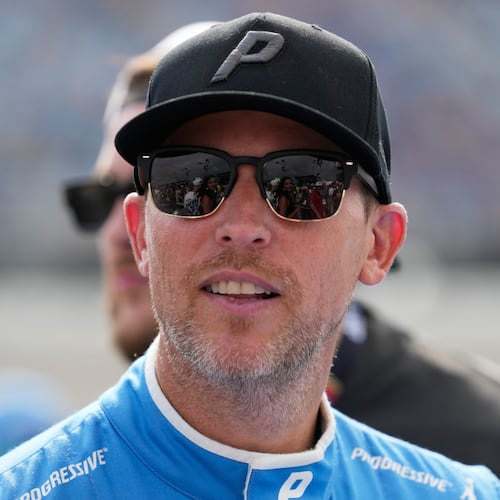 Denny Hamlin looks around before the start of a NASCAR Cup Series auto race at Chicagoland Speedway in Joliet, Ill., Sunday, July 5, 2026. (AP Photo/Nam Y. Huh)