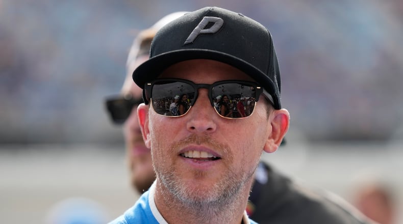Denny Hamlin looks around before the start of a NASCAR Cup Series auto race at Chicagoland Speedway in Joliet, Ill., Sunday, July 5, 2026. (AP Photo/Nam Y. Huh)