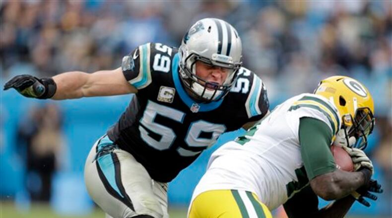FILE - In this Nov. 8, 2015, file photo, Carolina Panthers' Luke Kuechly (59) moves in to to tackle Green Bay Packers' James Starks (44) during the second half of an NFL football game in Charlotte, N.C. Off from the field, Panthers safety Roman Harper says Kuechly is �the nicest guy you ever want to meet.� But when Kuechly hits the field, teammates say he changes into a person you wouldn�t recognize, ferocious, fiery and competitive. (AP Photo/Bob Leverone, File)