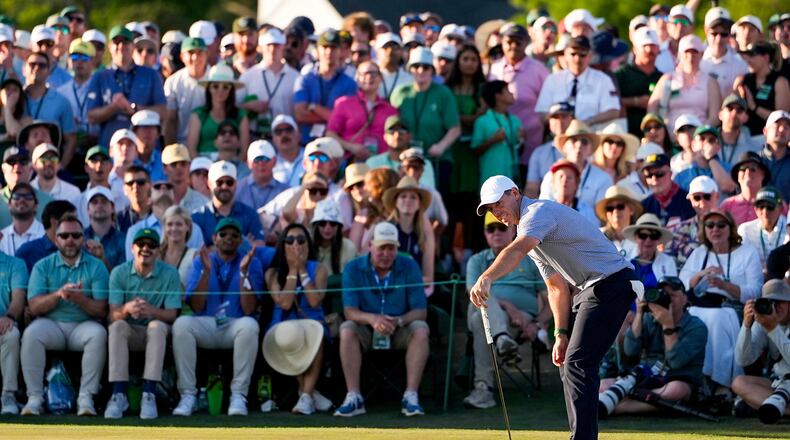 Rory McIlroy, of Northern Ireland, reacts after missing a putt on the 18th hole during the third round of the Masters golf tournament at the Augusta National Golf Club, Saturday, April 11, 2026, in Augusta, Ga. (AP Photo/Ashley Landis)