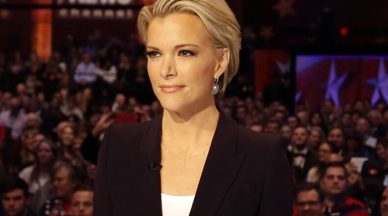 In this Jan. 28, 2016, photo, moderator Megyn Kelly waits for the start of the Republican presidential primary debate in Des Moines, Iowa.