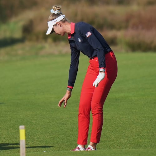 Nelly Korda of the United States takes a drop on the 16th fairwayduring the Solheim Cup at the Bernardus Golf course in Den Bosch, Netherlands, Saturday, Sept. 12, 2026. (AP Photo/Alastair Grant)