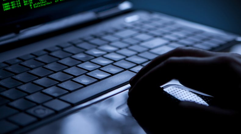 A state authority that manages a key database of Georgia real estate records said it thwarted a ransomware attack and has returned its website and systems back to normal operations. (Dreamstime/TNS)