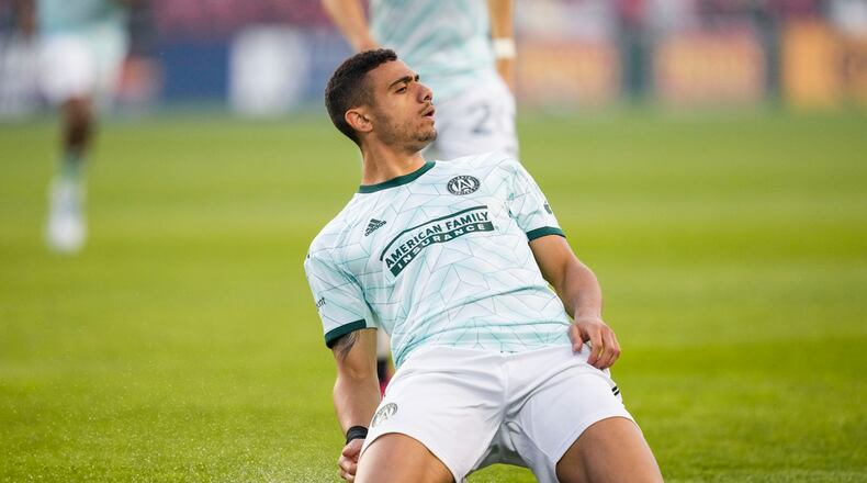 Atlanta United forward Giorgos Giakoumakis celebrates his goal against Toronto FC during the first half of an MLS soccer match Saturday, April 15, 2023, in Toronto. (Andrew Lahodynskyj/The Canadian Press via AP)