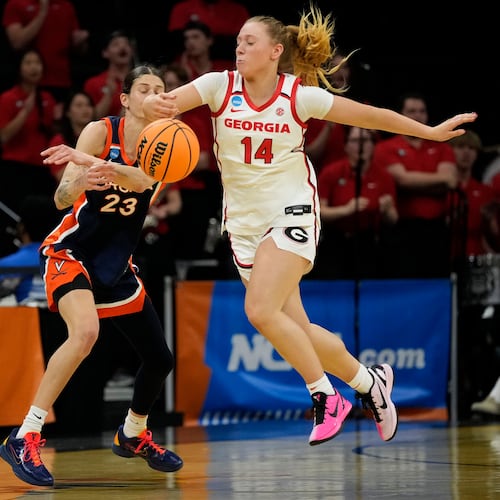 Georgia guard Rylie Theuerkauf (right) — pictured making a steal against Virginia in their NCAA Tournament first-round game last month — is one of only two of the Bulldogs' top eight leading scorers to not announce they intend to transfer. Theuerkauf averaged 11.9 points per game, third-best on the team. Savannah Henderson, UGA's sixth-leading scorer at 3.8 ppg, is the Bulldogs' other top-eight scorer to not enter the transfer portal. (Charlie Neibergall/AP)