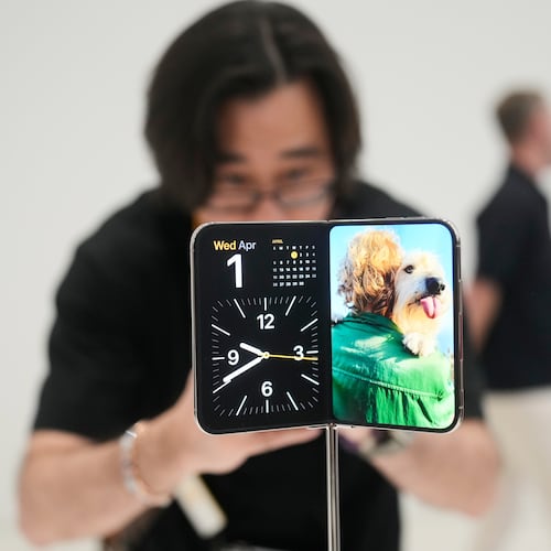 The iPhone Duo is displayed on Wednesday, Sept. 9, 2026, on the Apple campus in Cupertino, Calif. (AP Photo/Jeff Chiu)