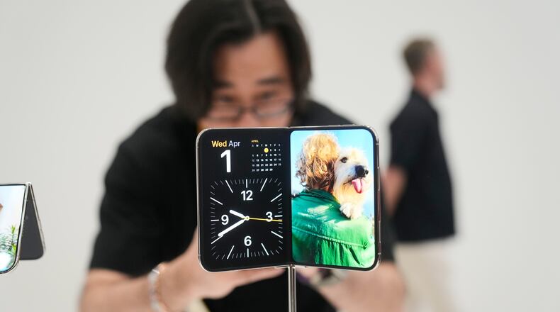The iPhone Duo is displayed on Wednesday, Sept. 9, 2026, on the Apple campus in Cupertino, Calif. (AP Photo/Jeff Chiu)