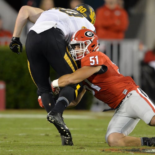 Former Georgia linebacker Jake Ganus (right), who played for the Bulldogs during the 2015 season, has been suspended by the Alabama High School Athletic Association and is not permitted to coach for the upcoming season. (Brant Sanderlin/AJC 2015)