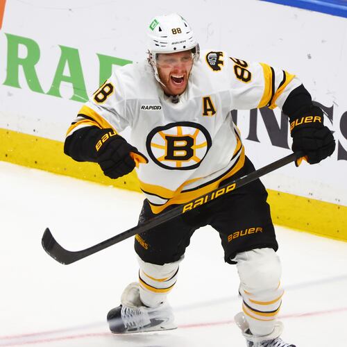 Boston Bruins right wing David Pastrnak (88) celebrates his goal during the overtime period in Game 5 of a first-round NHL hockey Stanley Cup playoff series against the Buffalo Sabres Tuesday, April 28, 2026, in Buffalo, N.Y. (AP Photo/Jeffrey T. Barnes)