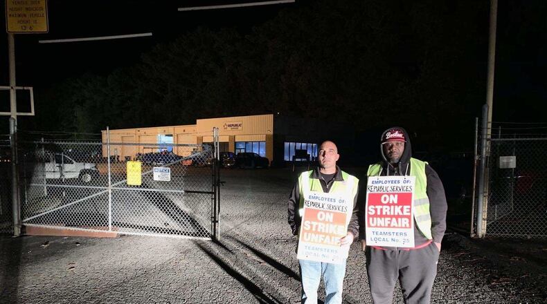 Striking workers early Friday morning. Members of Teamsters Local Union 728 who work at Republic Services’ location at 2530 Business Drive in Cumming are picketing for safer conditions.