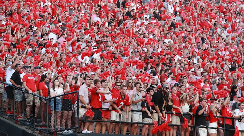 August 31, 2019 Nashville: Georgia fans look on and celebrate a second touchdown for a 14-0 lead over Vanderbilt during the first quarter in a NCAA college football game on Saturday, August 31, 2019, in Nashville. Curtis Compton/ccompton@ajc.com
