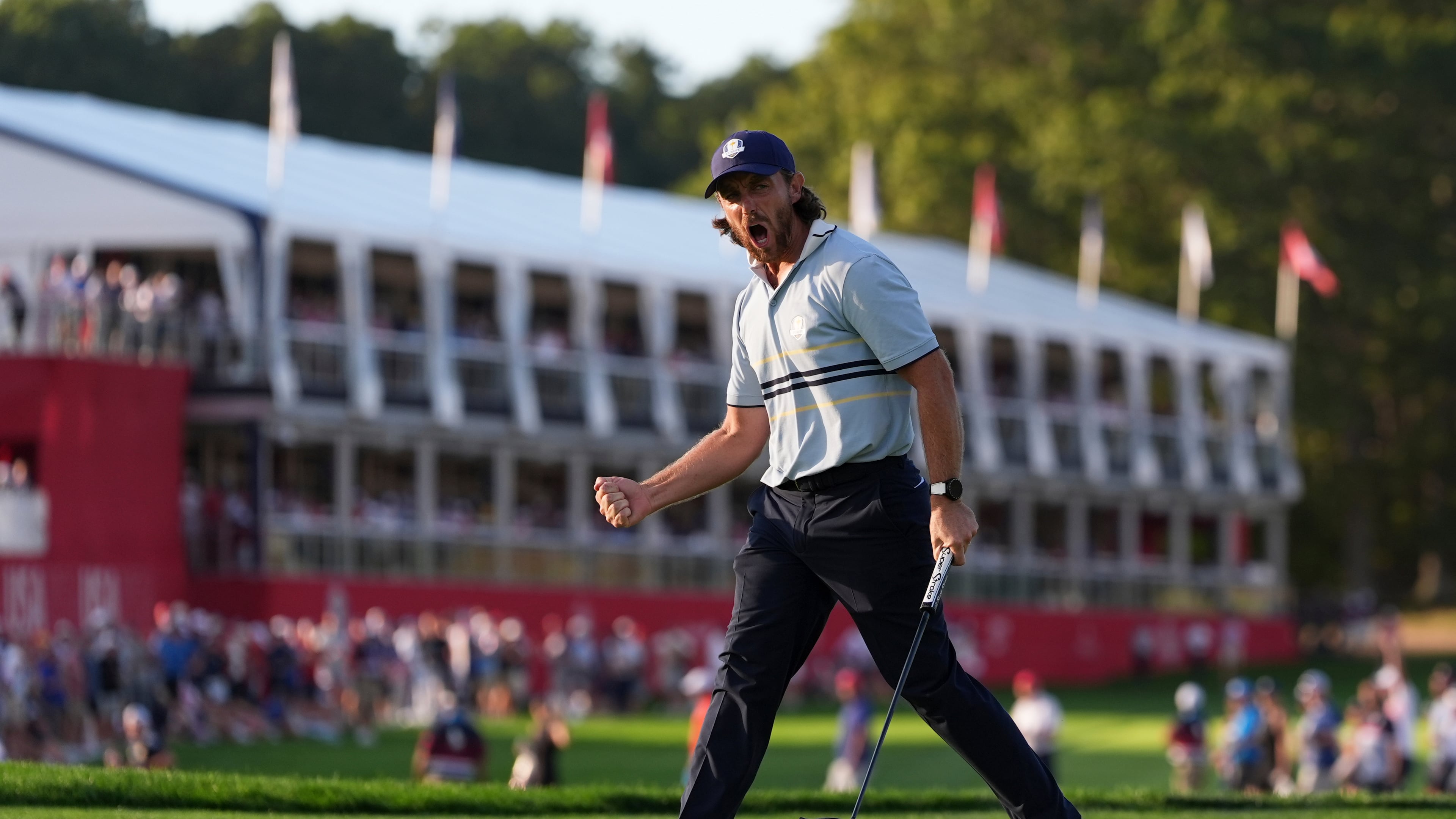 Europe's Tommy Fleetwood celebrates after a birdie on the 16th hole at Bethpage Black golf course during the Ryder Cup golf tournament, Friday, Sept. 26, 2025, in Farmingdale, N.Y. (AP Photo/Lindsey Wasson)