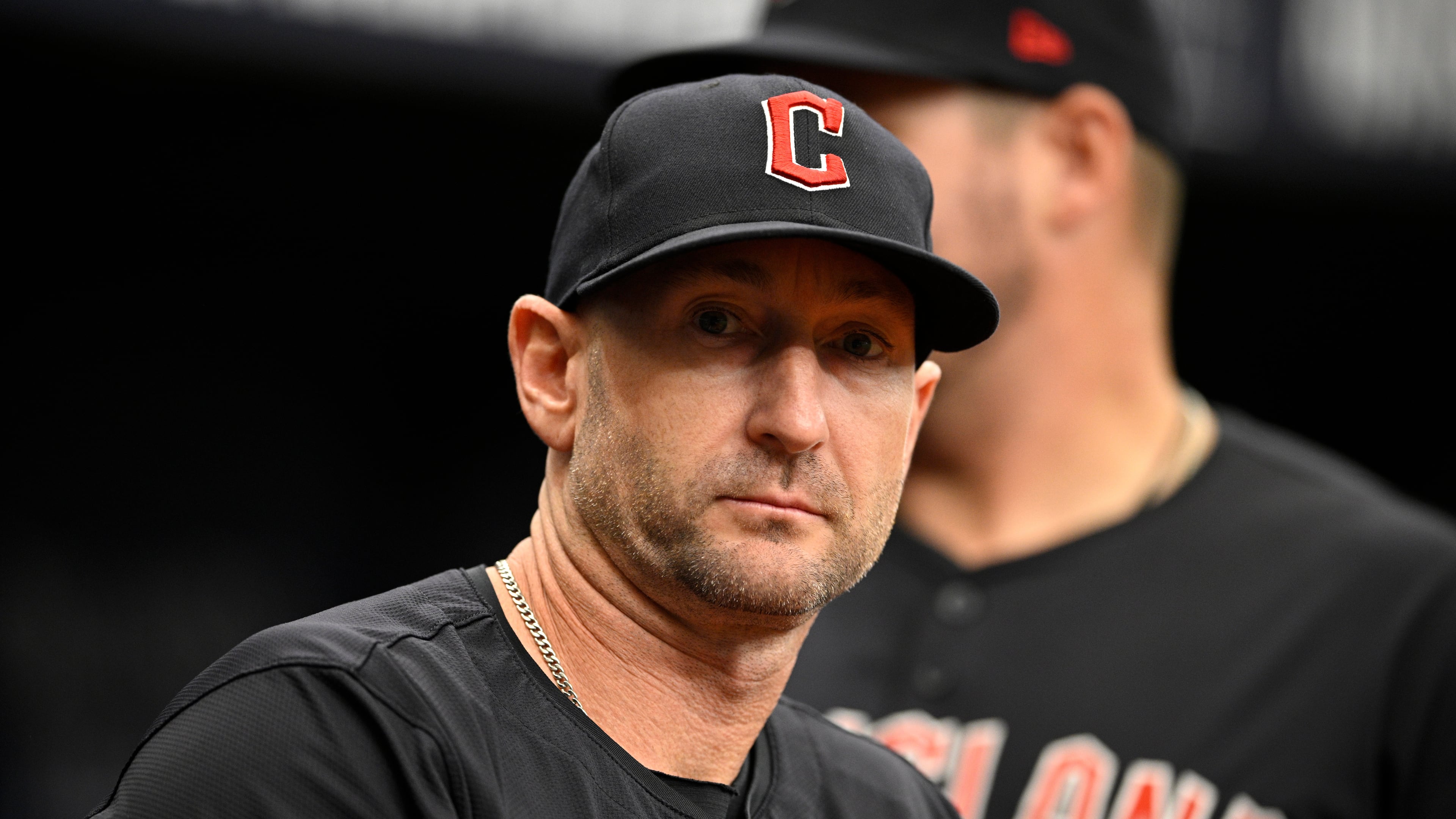 FILE - Cleveland Guardians bench coach Craig Albernaz looks on from the dugout before a baseball game against the Tampa Bay Rays, July 14, 2024, in St. Petersburg, Fla. (AP Photo/Phelan M. Ebenhack, File)