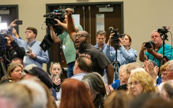 Marjorie Taylor Greene held a town hall at the Acworth Community Center on Tuesday. Protesters lined the street outside and disrupted the meeting multiple times.