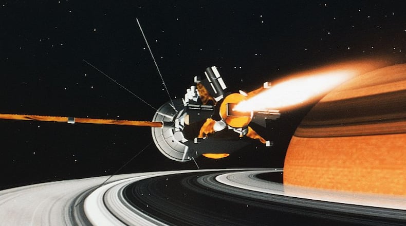 An artist’s drawing of the Cassini-Huygens spacecraft in orbit around Saturn.