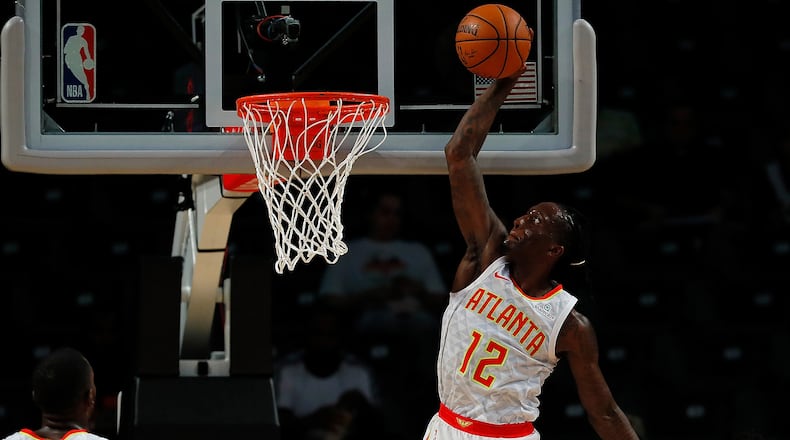ATLANTA, GA - OCTOBER 12: Taurean Prince #12 of the Atlanta Hawks dunks against the Dallas Mavericks at McCamish Pavilion on October 12, 2017 in Atlanta, Georgia. (Photo by Kevin C. Cox/Getty Images)
