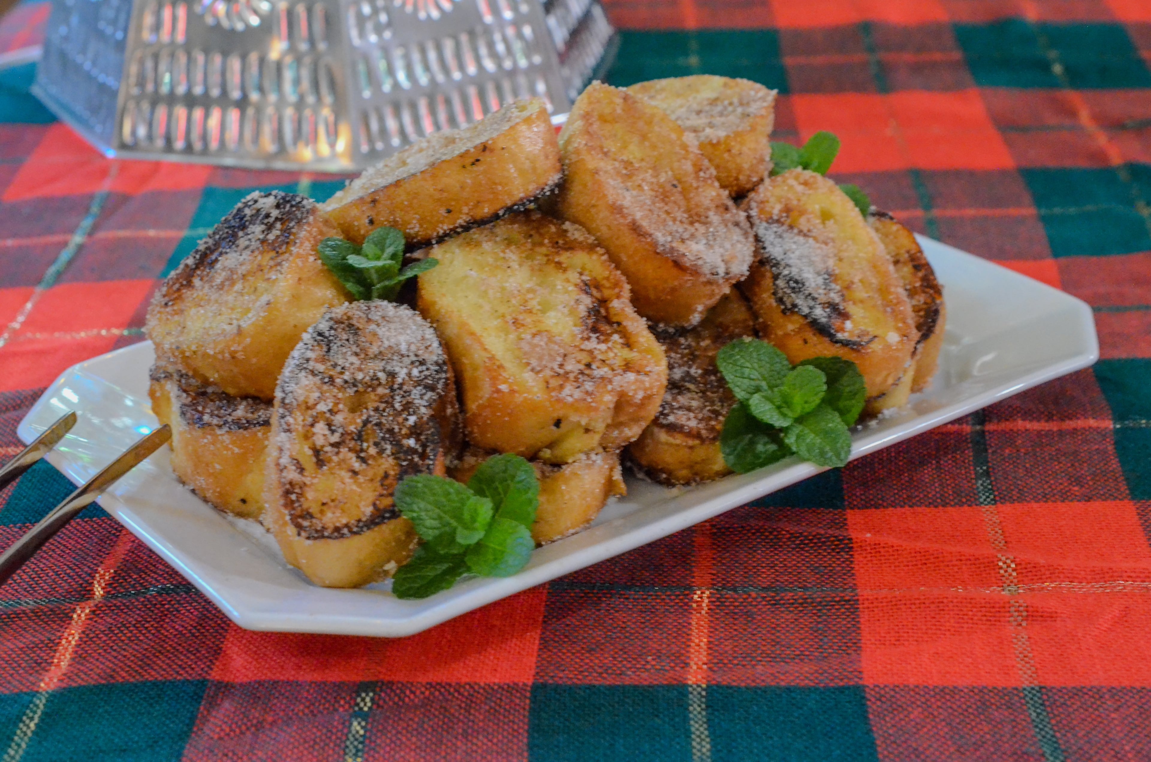 Rabanadas, a Brazilian dessert that resembles French toast, is creamy on the inside and crunchy on the outside. (Virginia Willis for The Atlanta Journal-Constitution)