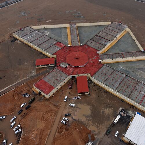 An aerial view shows the al-Aqtan prison after government troops took control of it from the Kurdish-led Syrian Democratic Forces, SDF, in Raqqa, northeastern Syria, Friday, Jan. 23, 2026. (AP Photo/Ghaith Alsayed)