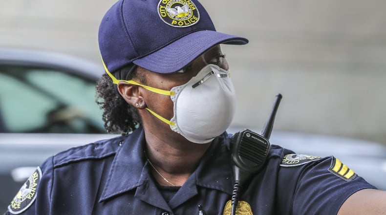 Atlanta Police Sgt. Dominique Simmons Friday, April 24, 2020, in downtown Atlanta. Coronavirus cases in Georgia continued to mount, as the state began easing restrictions on some businesses. JOHN SPINK/JSPINK@AJC.COM