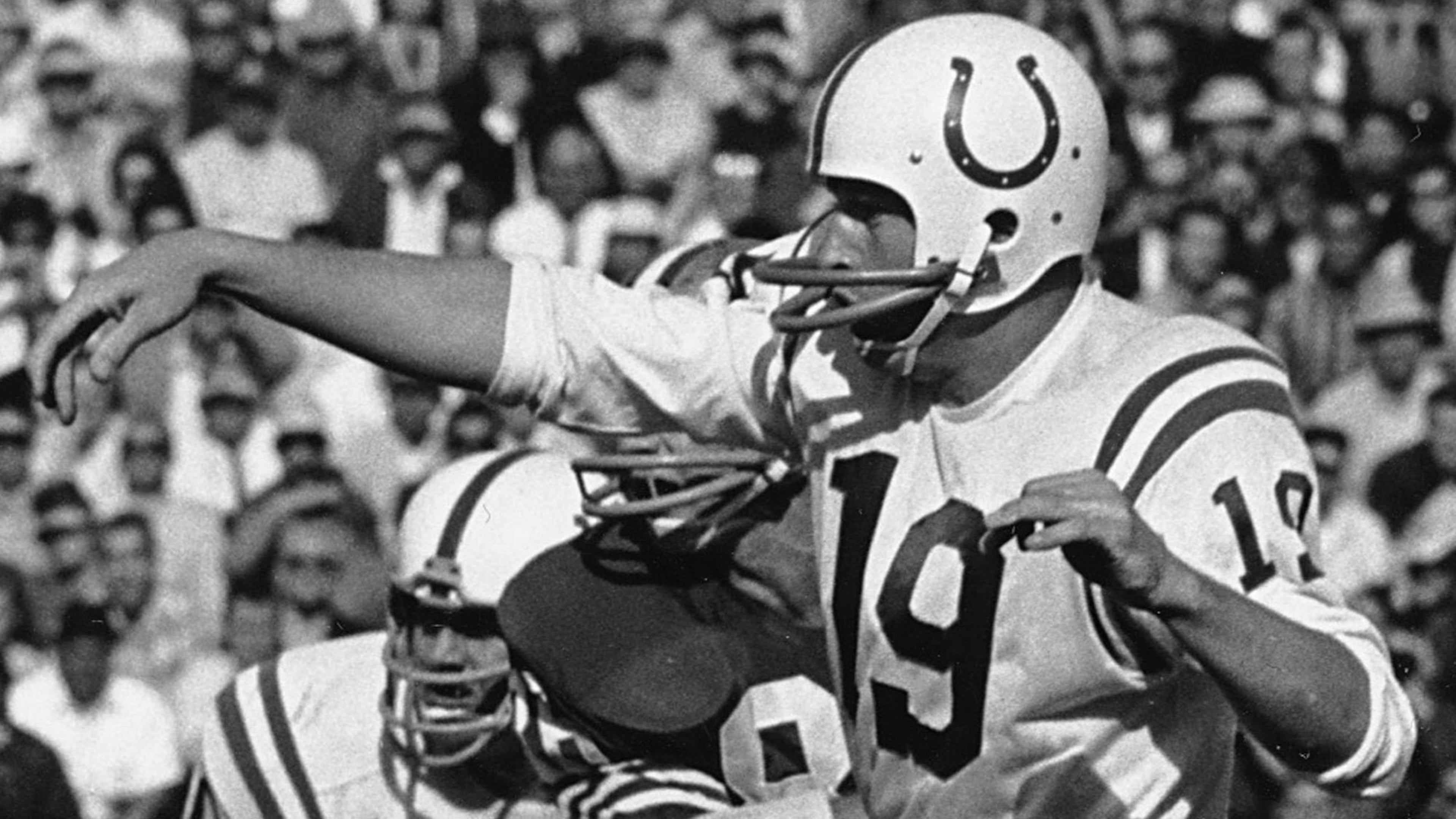 In this 1962 file photo, Johnny Unitas of the Baltimore Colts throws a pass.
