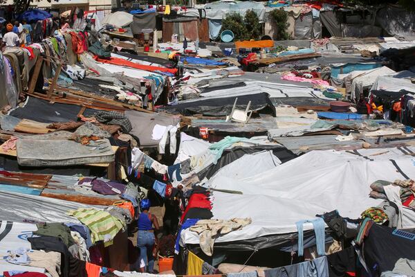Makeshift tents fill a camp set up by people displaced from their homes by gang violence in Port-au-Prince, Haiti, Monday, April 14, 2025. (AP Photo/Odelyn Joseph)