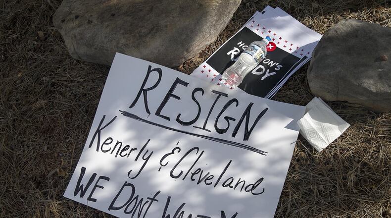 A sign demanding the resignation of Hoschton Mayor Theresa Kenerly and City Council Member Jim Cleveland sits near City Hall in Hoschton, Monday, May 6, 2019. ALYSSA POINTER / ALYSSA.POINTER@AJC.COM