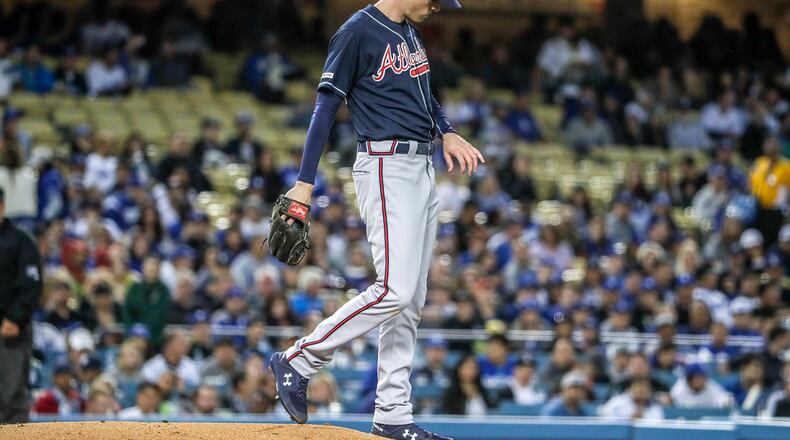Atlanta Braves starting pitcher Max Fried looks at his hand after it was struck by liner hit by the Los Angeles Dodgers' Alex Verdugo in the second inning at Dodger Stadium in Los Angeles on Tuesday, May 7, 2019. Fried was removed from the game after the play. (Robert Gauthier/Los Angeles Times/TNS)