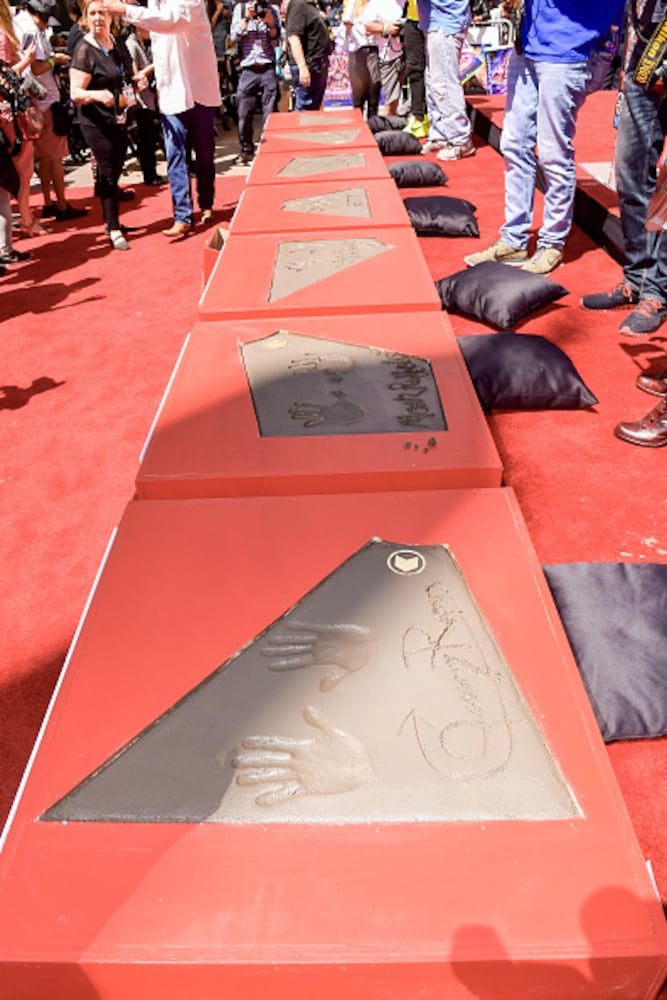 Photos: ‘Avengers’ cast cement place in movie history