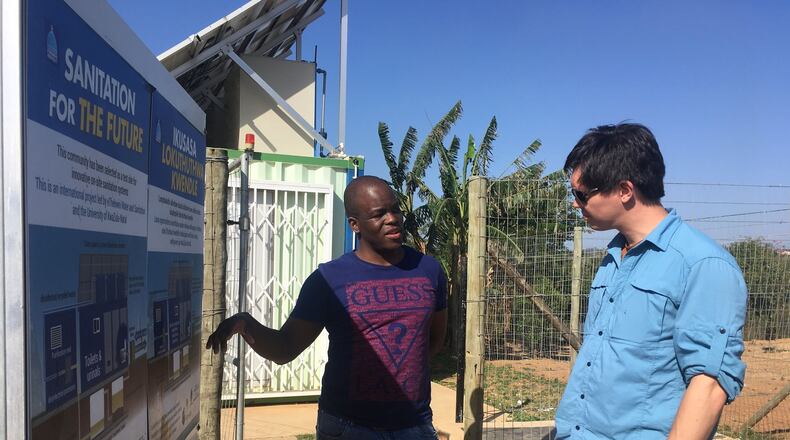 Shannon Yee, a Georgia Tech engineering professor, was in South Africa in August looking over sanitation systems and prototypes of self-contained toilets that process the waste inside the units. Courtesy of Shannon Yee.