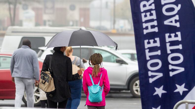 People leave the Gwinnett County Voter Registration and Elections office in Lawrenceville after voting on the proposed MARTA expansion into Gwinnett County Saturday, March 9, 2019. STEVE SCHAEFER / SPECIAL TO THE AJC