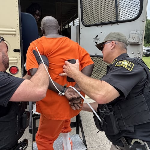 In this photo provided by the North Carolina State Bureau of Investigation, law enforcement officers load an inmate for transport Monday, June 29, 2026, at the Bertie-Martin Regional Detention Center Windsor, Bertie County, N.C. (North Carolina Bureau State Bureau of Investigation via AP)