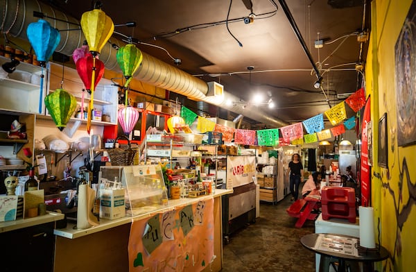The interior of Qommunity in East Atlanta Village in 2022. (Ryan Fleisher for the AJC)