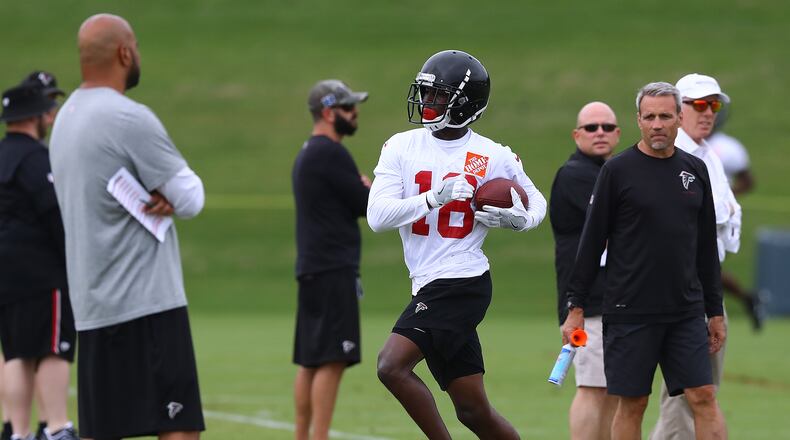 Wide receiver Calvin Ridley runs out of bounds after catching a bomb on the first day of mandatory mini-camp on Tuesday, June 12, 2018, in Flowery Branch. Curtis Compton/ccompton@ajc.com