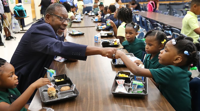 August 7, 2017 Lithonia; DeKalb Schools Superintendent Dr. R. Stephen Green gives 6-year-old kindergarten student Lanyah Bailey a fist bump during the first day of school at Edward L Bouie Elementary School on Monday, August 7, 2017, in Lithonia. Curtis Compton/ccompton@ajc.com