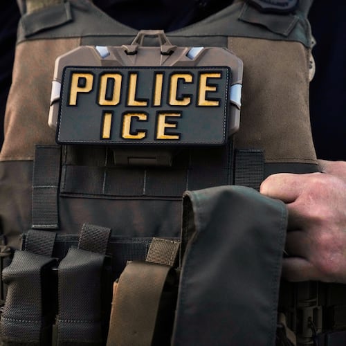 FILE - A U.S. Immigration and Customs Enforcement agent is seen in Park Ridge, Ill., Sept. 19, 2025. (AP Photo/Erin Hooley, File)