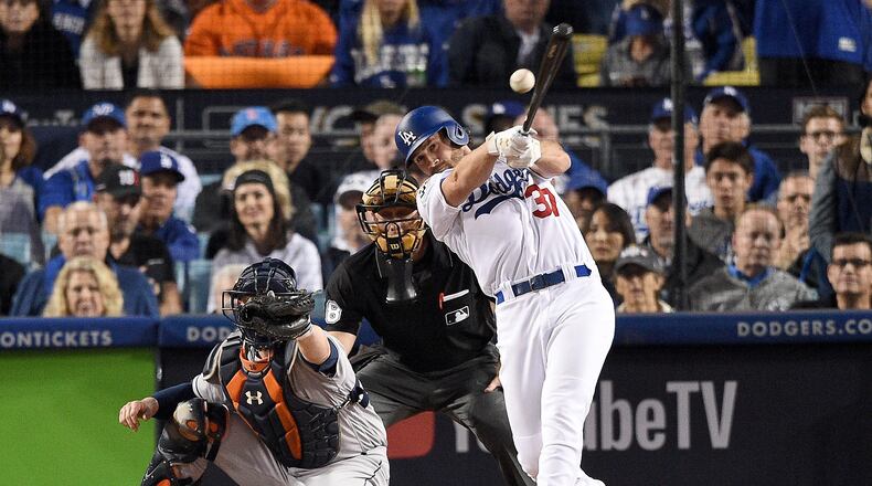 Charlie Culberson of the Dodgers hits a single during the eighth inning against the Astros in Game 6 of the 2017 World Series at Dodger Stadium on October 31, 2017 in Los Angeles, California.  (Photo by Kevork Djansezian/Getty Images)