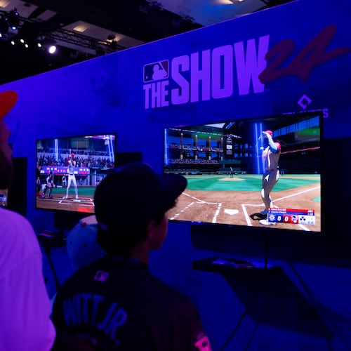 Fans play MLB: The Show during the 2024 Capital One All-Star Village at Globe Life Field on Saturday, July 13, 2024 in Arlington, Texas. (Photo by Ray Bahner/MLB Photos via Getty Images)