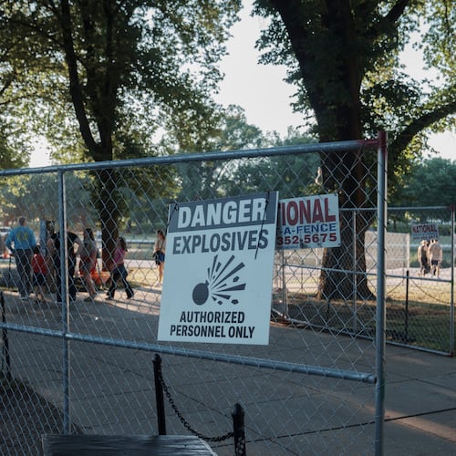 Fencing that will secure an area around where fireworks for the Fourth of July will be launched is seen near the Lincoln Memorial Reflecting Pool and the World War II Memorial Tuesday, June 23, 2026, in Washington. (AP Photo/Jon Elswick)