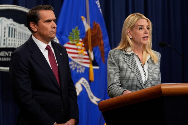 Attorney General Pam Bondi speaks as Deputy Attorney General Todd Blanche listens during a news conference about Kilmar Abrego Garcia at the Justice Department, Friday June 6, 2025, in Washington. (AP Photo/Julia Demaree Nikhinson)