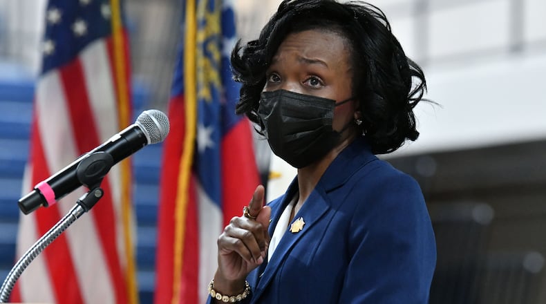January 7, 20201 Marietta - Lisa Cupid speaks after she was sworn in as new chair of county commission by Cobb County Superior Court judges Robert E. Flournoy III and Adele Grubbs at Cobb County Civic Center in Marietta on Thursday, January 7, 2021. (Hyosub Shin / Hyosub.Shin@ajc.com)