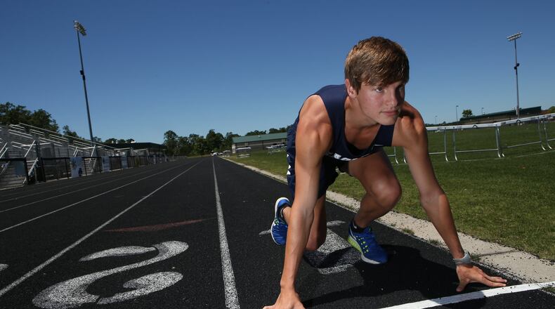 Chase Kennedy, 19, poses for a portrait at the East Jackson High School track in Commerce, Georgia, on May 2, 2017. Kennedy holds five individual state titles, three in cross country and two in track, as well as one team state cross country title. He will be attending Kennesaw State on a running scholarship. (HENRY TAYLOR / HENRY.TAYLOR@AJC.COM)