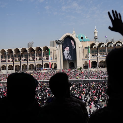 Mourners attend the start of the dayslong funeral ceremonies for slain Iranian Supreme Leader Ayatollah Ali Khamenei and members of his family at the Imam Khomeini Mosalla Grand Mosque in Tehran, Iran, Saturday, July 4, 2026. (AP Photo/Altaf Qadri)