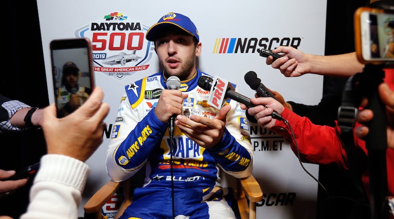 A bouquet of microphones greets Chase Elliott during a media gathering this week at Daytona.