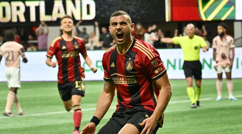 Atlanta United's Giorgos Giakoumakis celebrates after scoring during the second half against Portland on Saturday night at Mercedes-Benz Stadium. Atlanta United won 5-1. (Hyosub Shin / Hyosub.Shin@ajc.com)