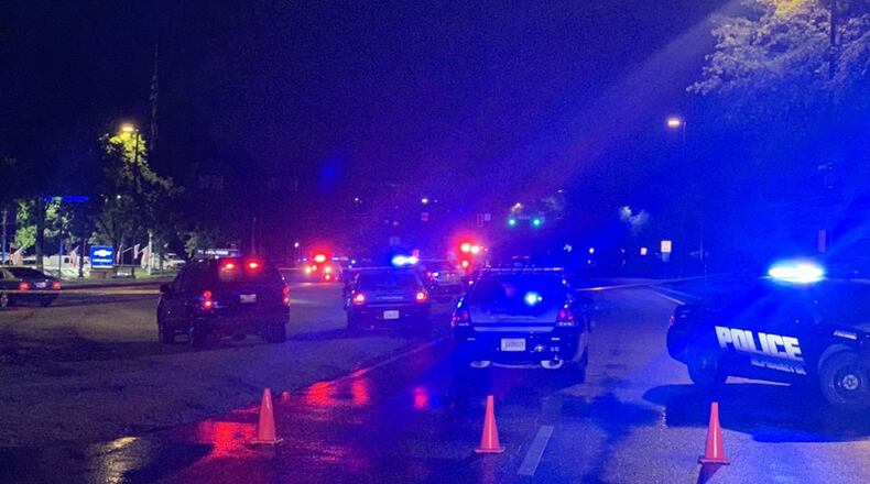 A driver shot and killed himself Thursday evening after fleeing a traffic stop in Alpharetta and dragging an officer in the process, police said.