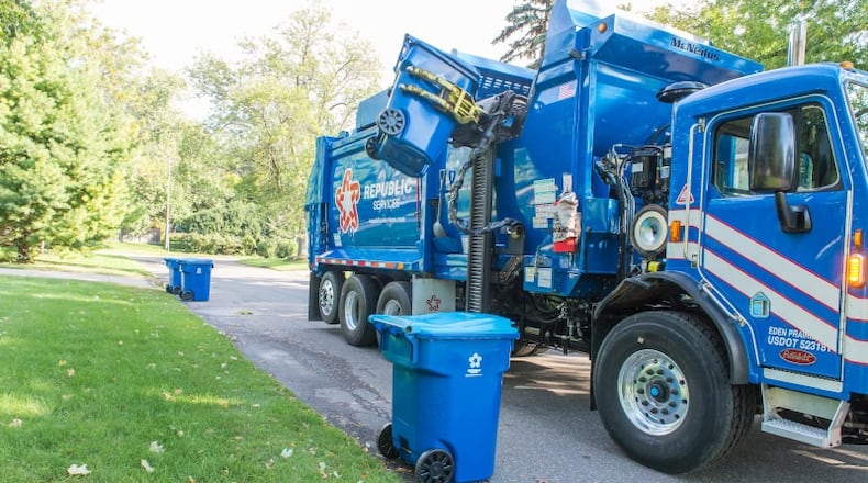 Republic Waste Services truck in action in metro Atlanta. Workers based in Atlanta have voted to authorize a strike against the company when the contract expires at the nd of July. (Courtesy Republic Services)